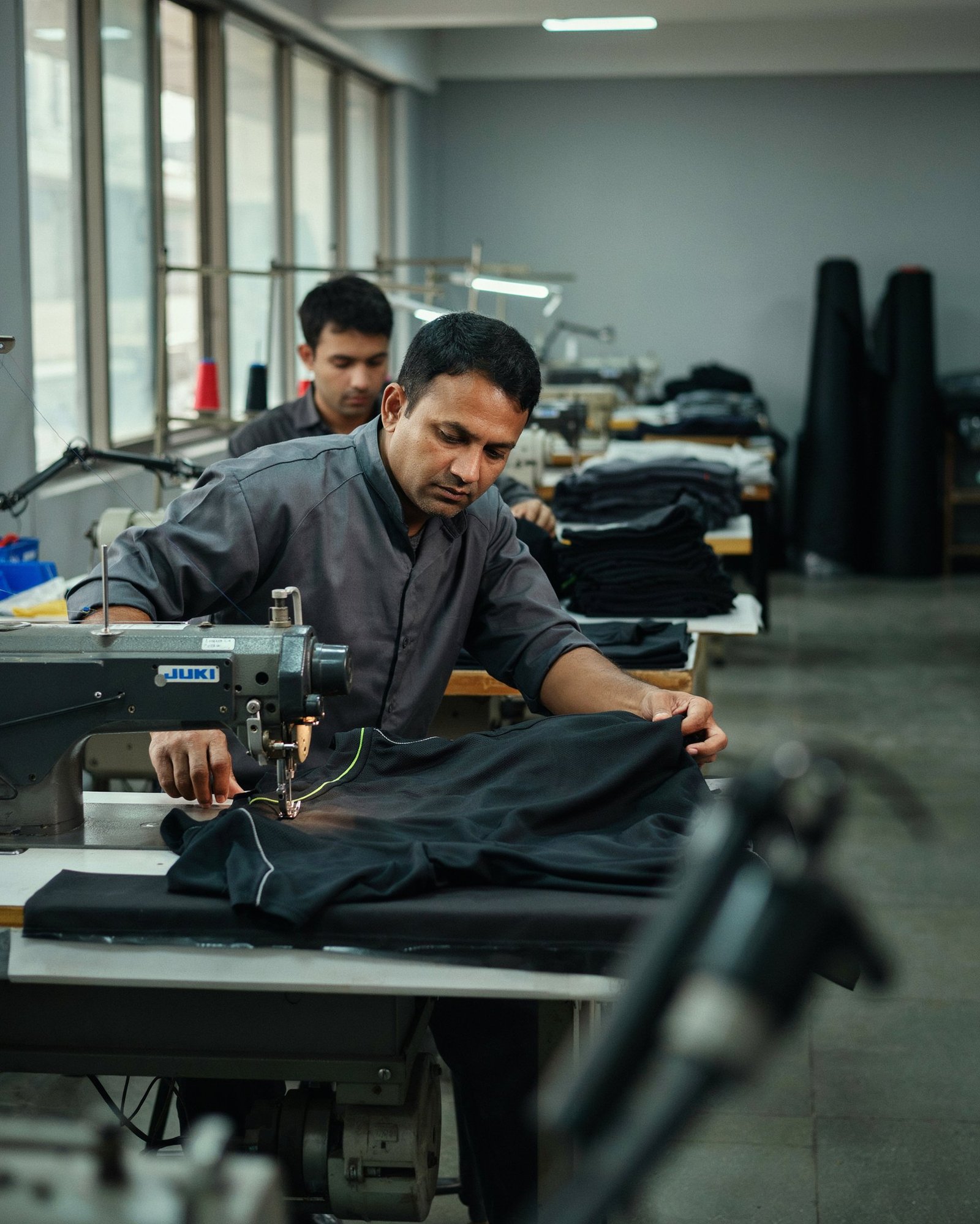 Sportswear garment stitching on an industrial sewing machine